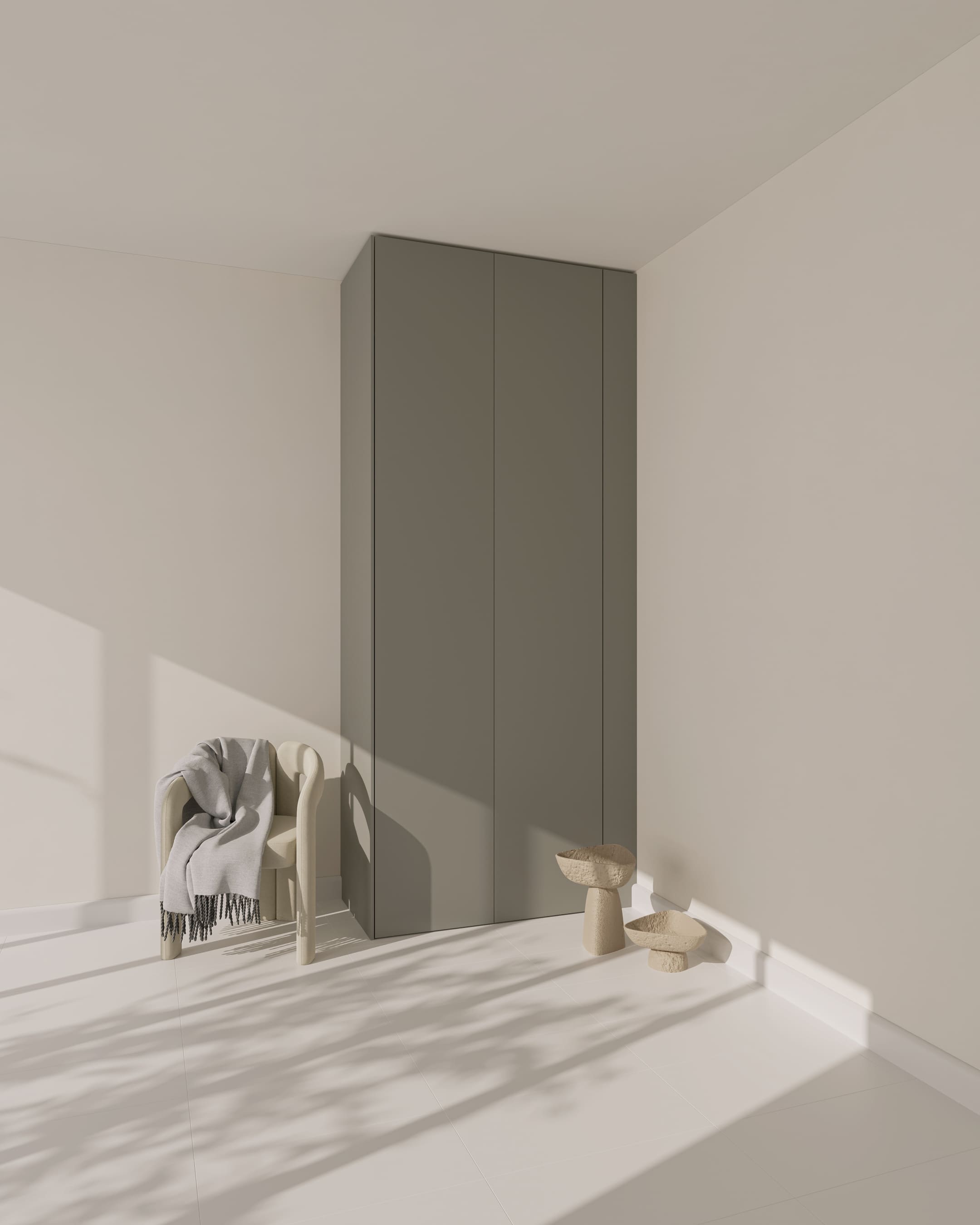 Eine graue, ultramatte Wandblende für einen PAX-Schrank in einem minimalistisch eingerichteten Raum.