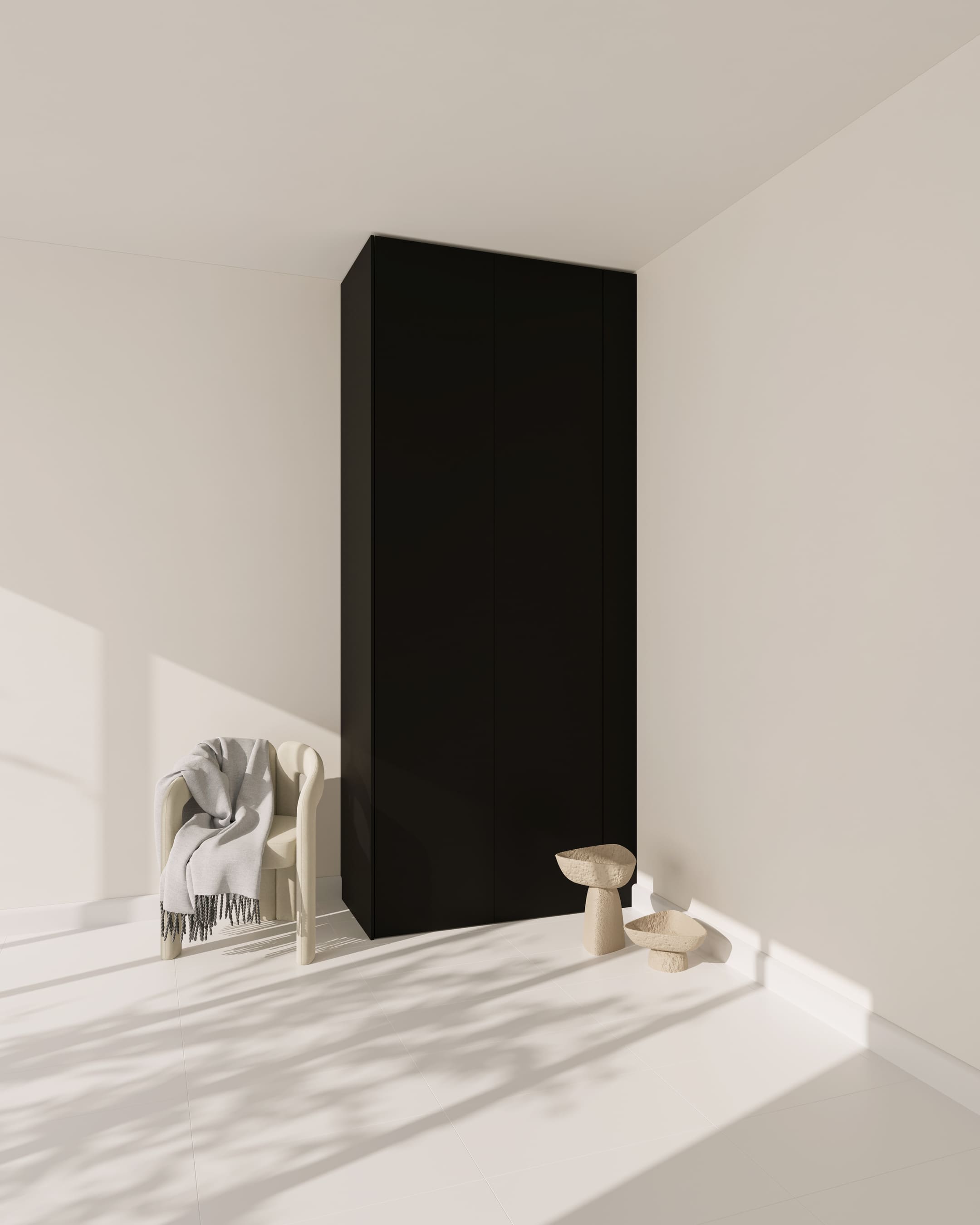 Schwarze, ultramatte PAX Wandblende in einem minimalistisch eingerichteten Raum.