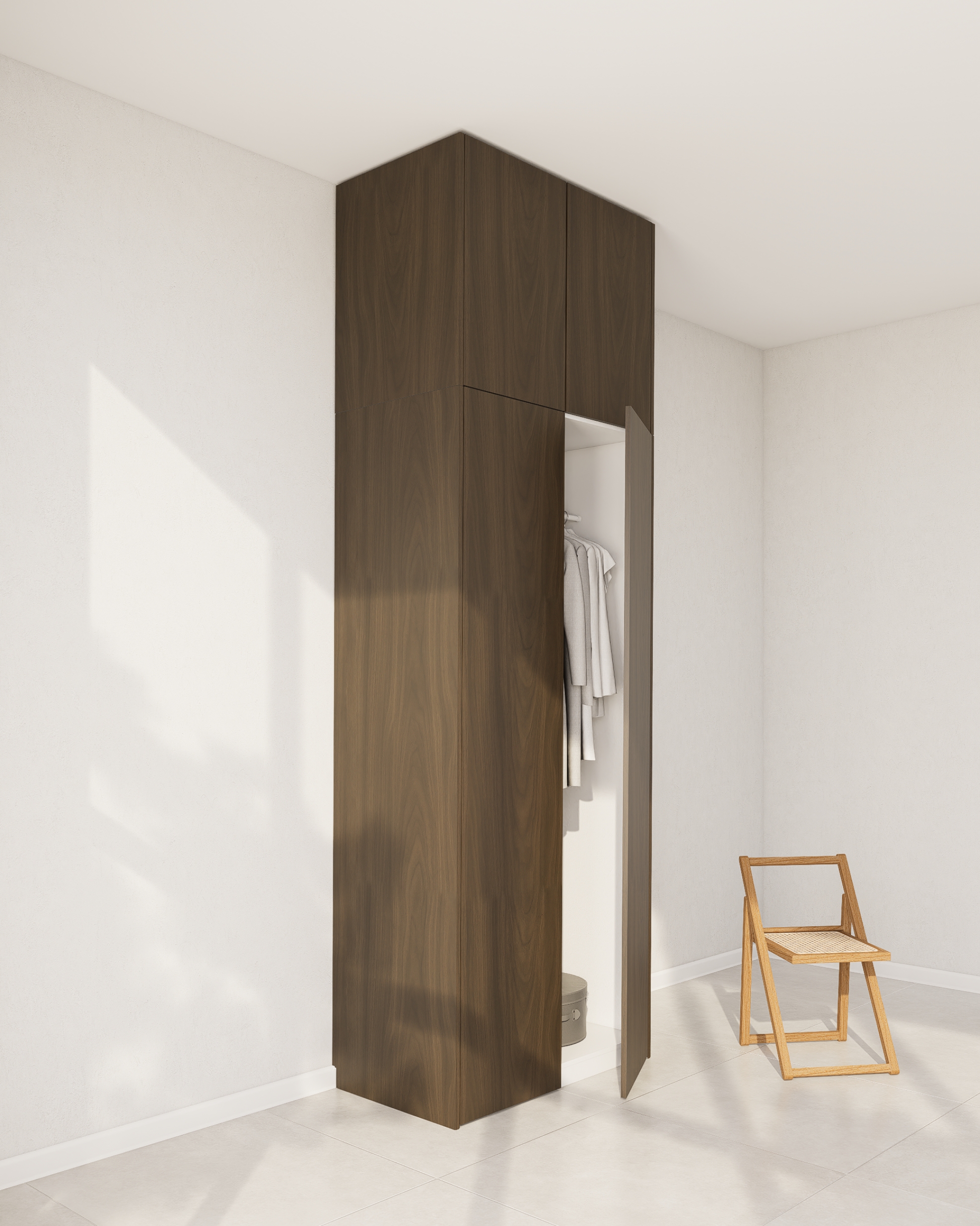 Dunkle Holzfurnier-Außenseite für einen PAX Aufsatzschrank in einem hellen Raum.